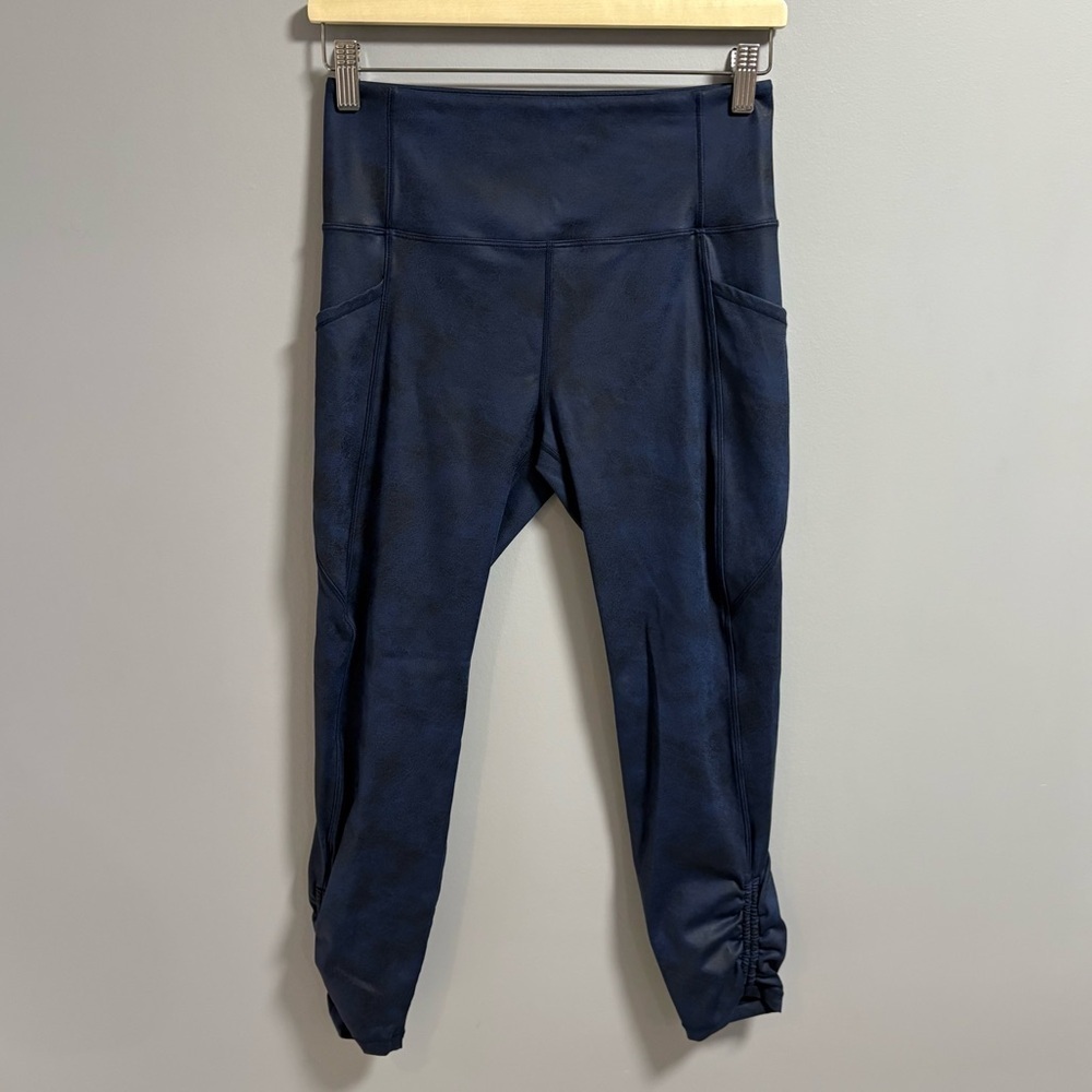 Zyia - Distressed Blue Ankle Cinch High Rise 7/8 Leggings